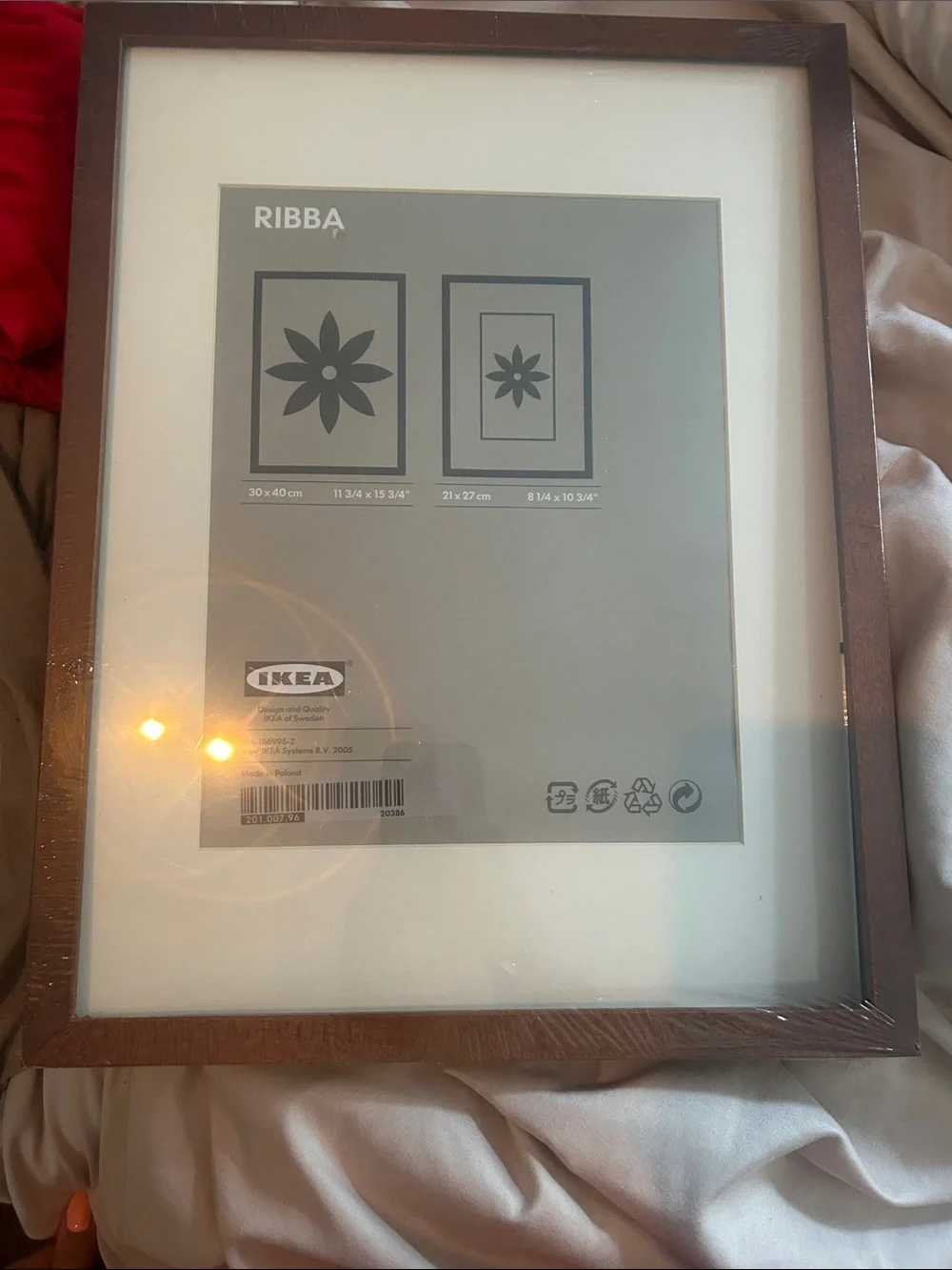 IKEA white picture frame with brown edge